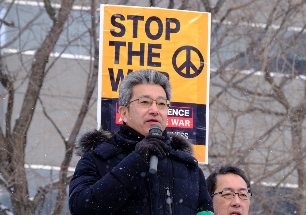 主催者挨拶する北海道平和運動フォーラムの長田・代表